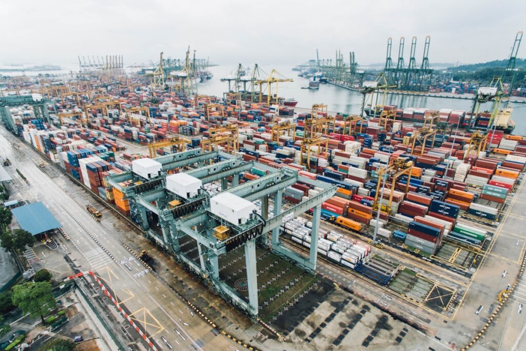 Shipping containers at a tropical port, guide to moving belongings to Costa Rica without surprises