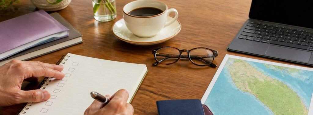 Costa Rica relocation planning checklist with map, coffee, and travel documents