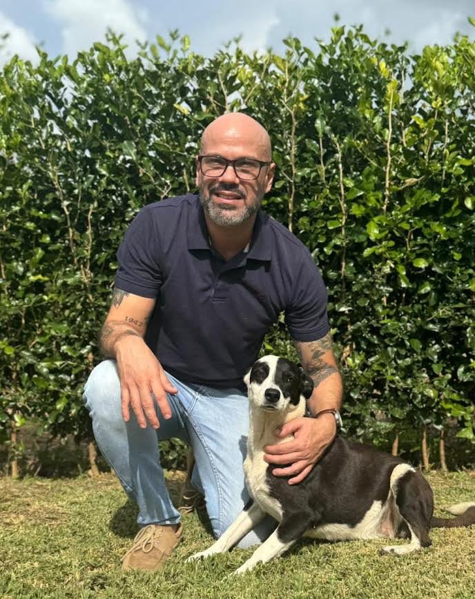 Javier Chinchilla with his pet, Mila